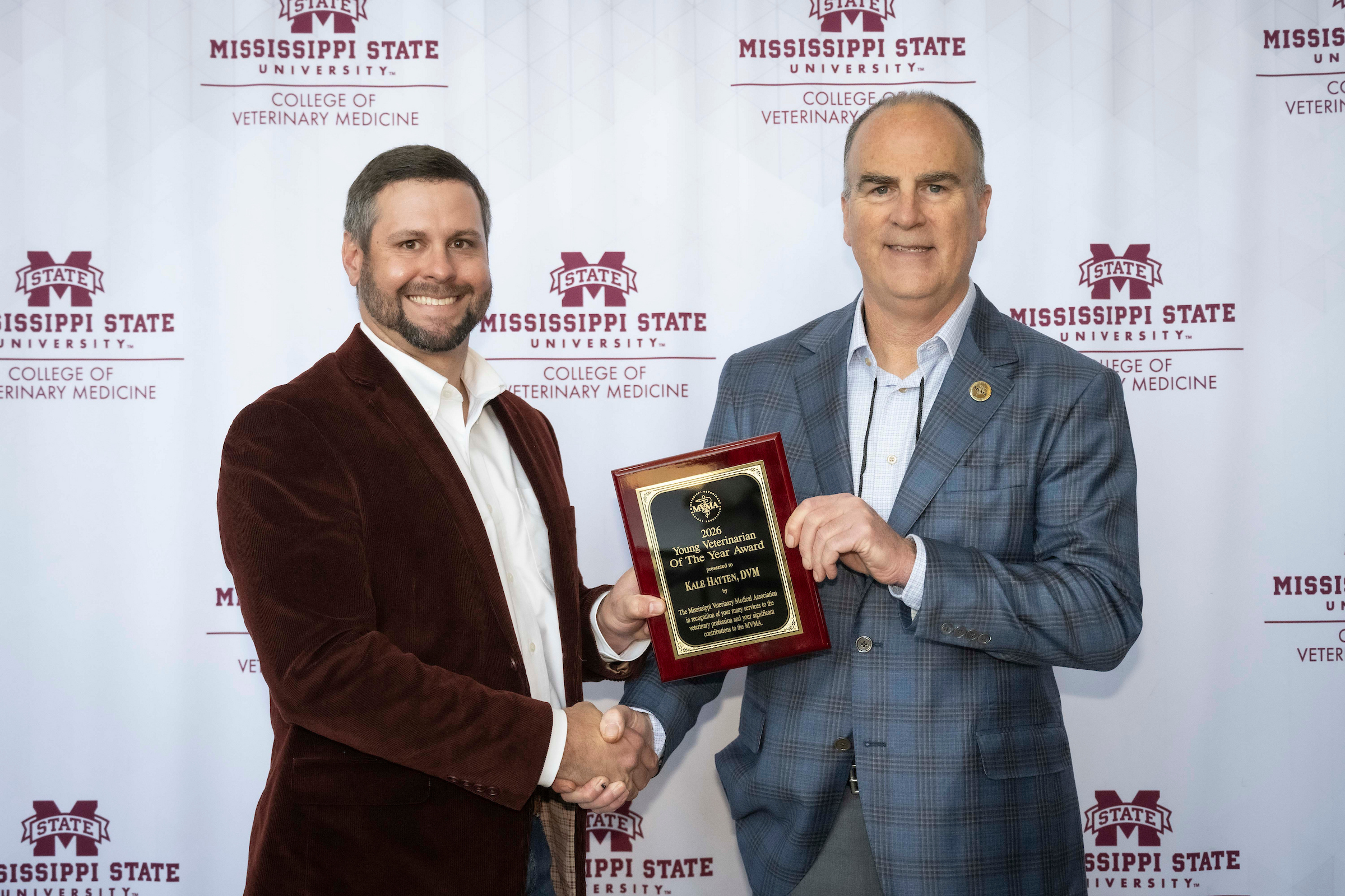 Dr. Kale Hatten accepts Young Vet of the Year Award