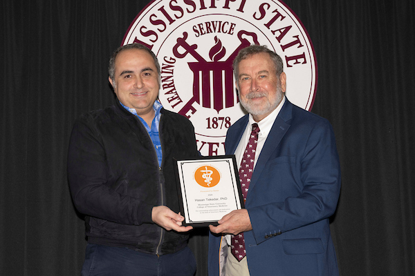 Hasan Tekedar and David Smith