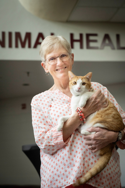 Dr. Sharon Grace and a cat.