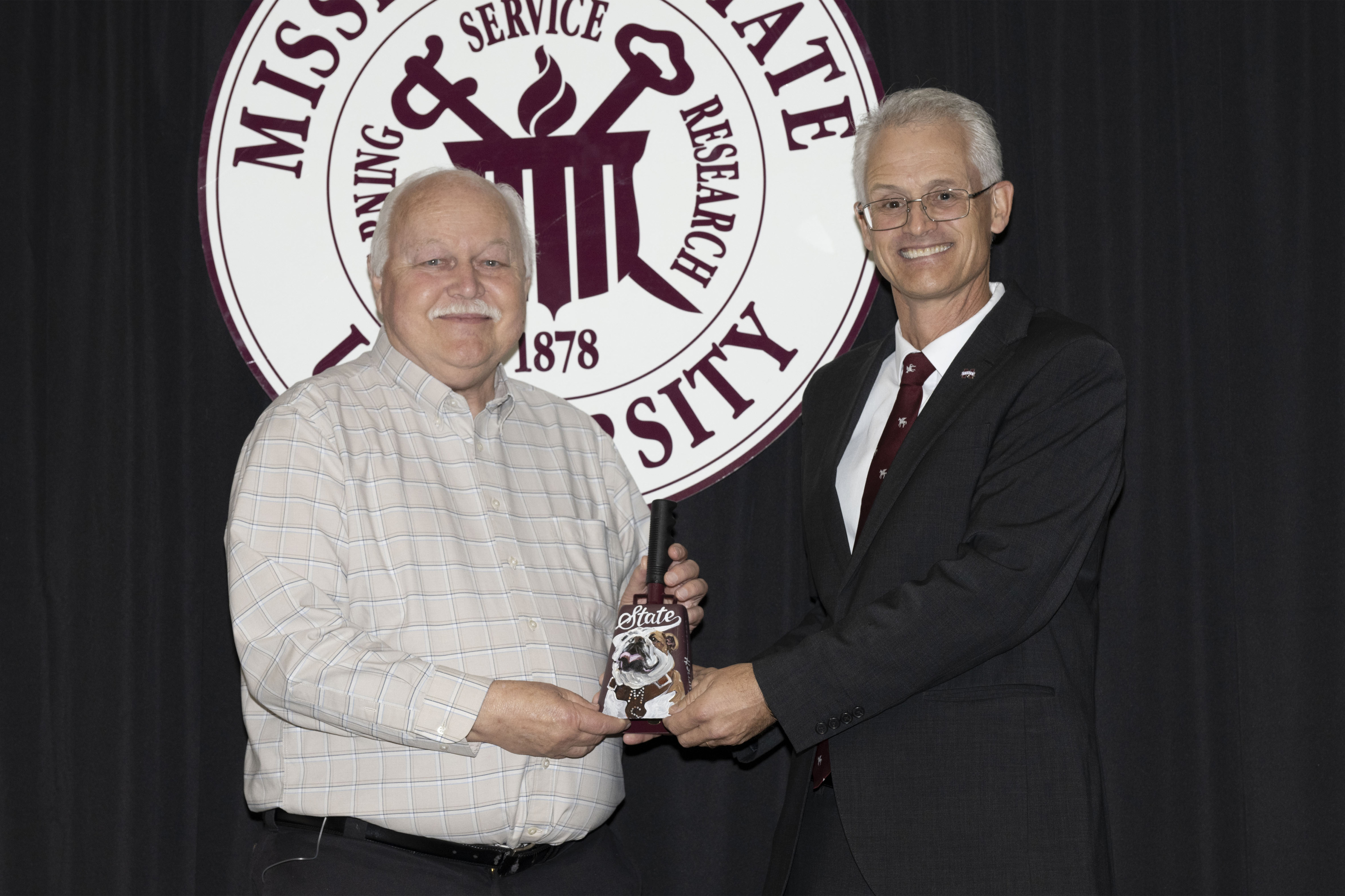 Dr. Skip Jack receives the Dean's Pegasus Award from Dean Nicholas Frank