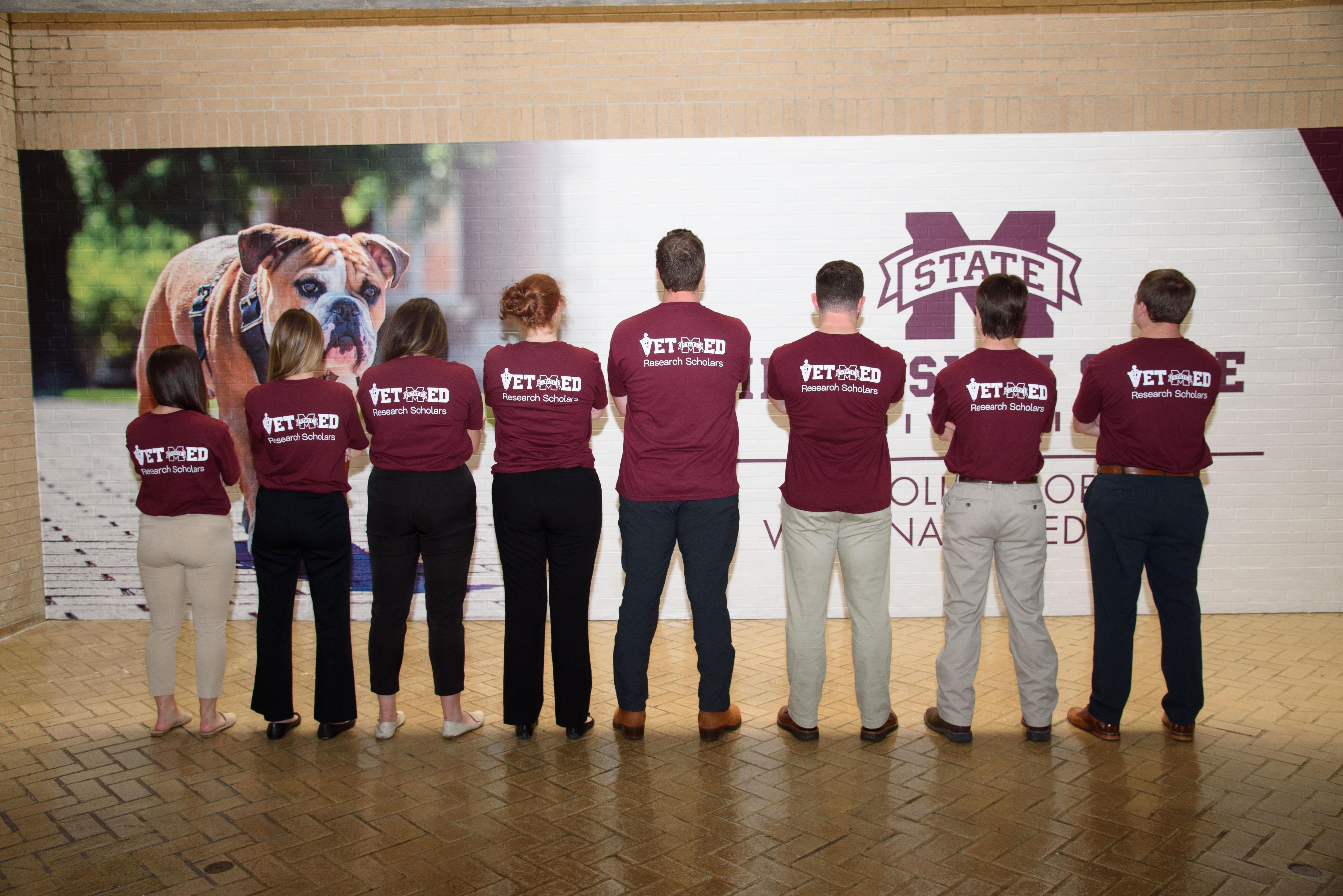 Students with their backs to the camera, showing VMRS shirts