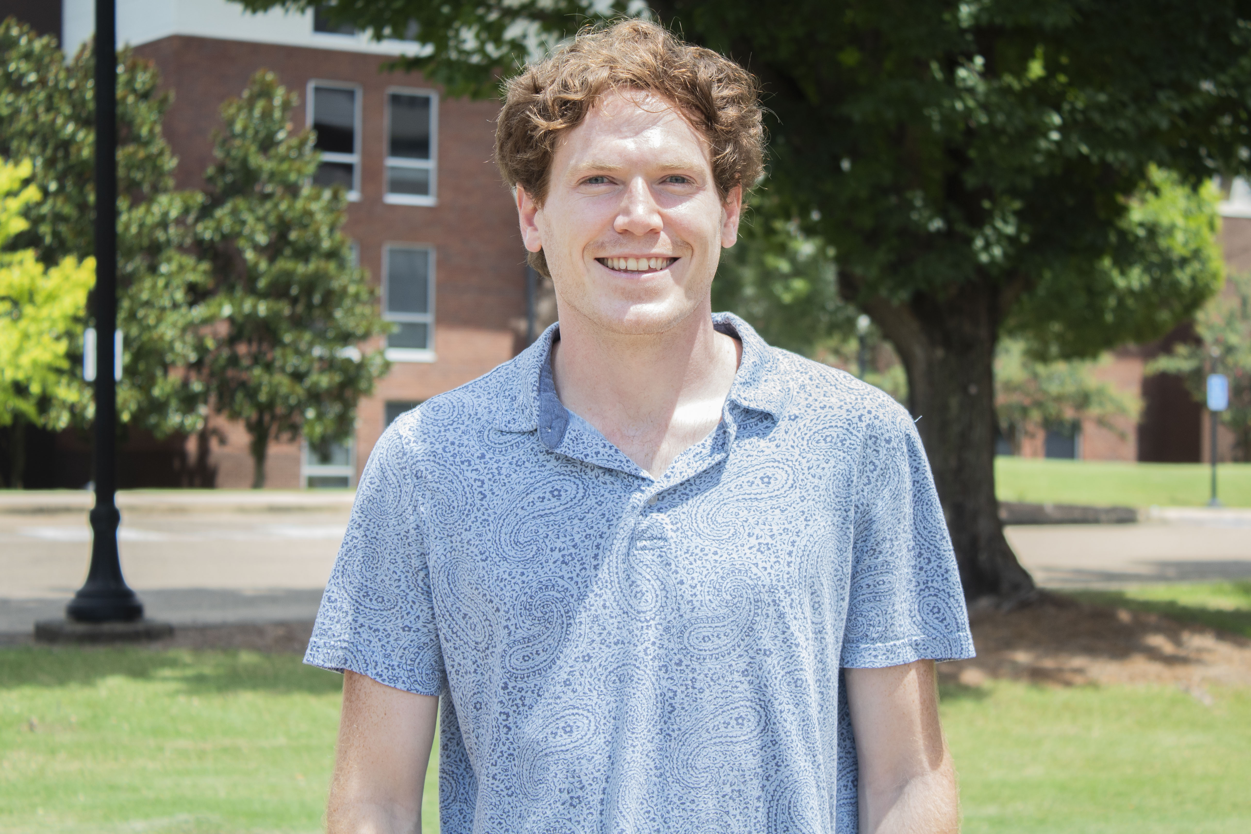 Branden Schaff, who has joined the Mississippi State University College of Veterinary Medicine Office of Psychological services on an external practicum, stands outside of Rice Hall on MSU's Starkville campus.